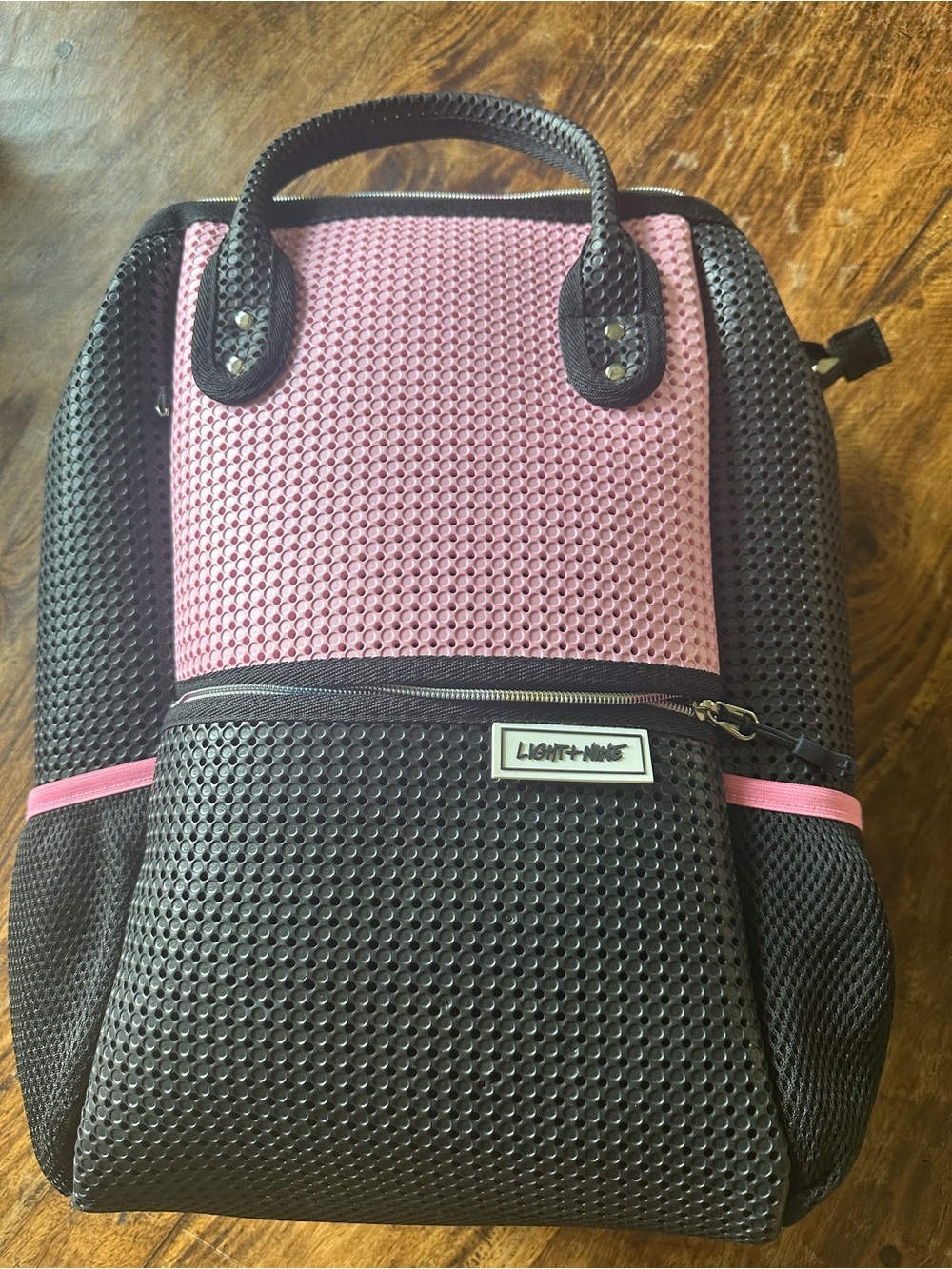 Light + nine master tall pink and black backpack